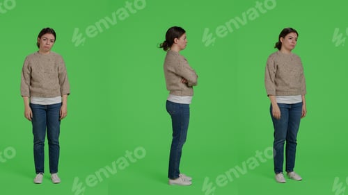 Preview: Discontent upset woman acting sad and discouraged posing over greenscreen