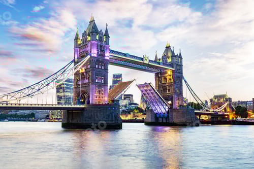 Preview: Tower Bridge in London, the UK at sunset. Drawbridge opening