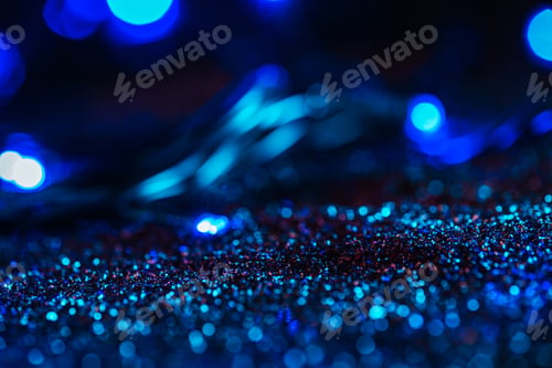 Preview: abstract glowing background with blue glitter and bokeh
