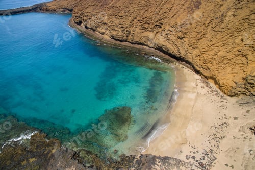 Preview: Ocean lagoon and sandy beach with rocks