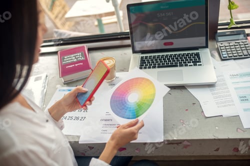 Preview: Designer making photo of color palette for new collection
