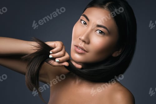 Preview: Young asian woman with straight black hair