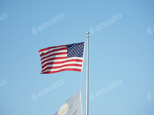Preview: Closeup shot of a flag of the US waving in Ernie Miller Nature CenterOlathe, KS