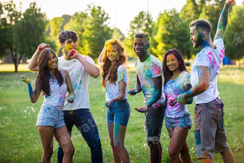 Preview: Friends playing with holi powder