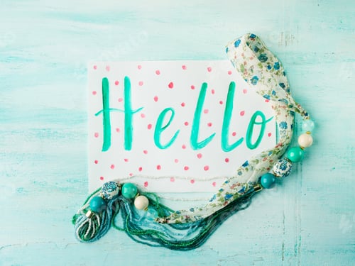 Preview: Hello card on pastel with necklace