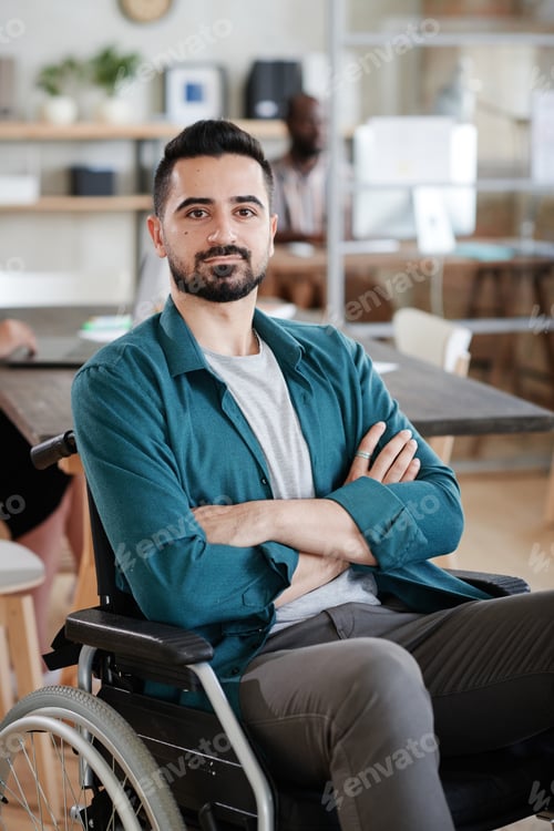 Preview: Disabled businessman at office