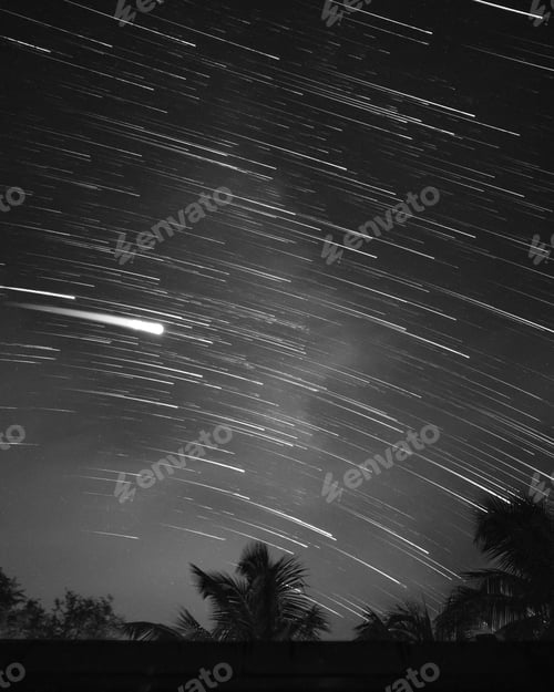 Preview: Greyscale of the effect of shiny falling stars in the night sky