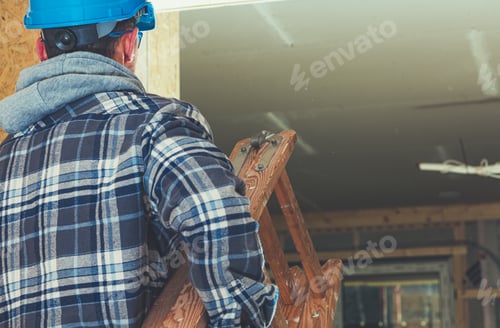 Preview: Construction Worker with Wooden Ladder in His Hands