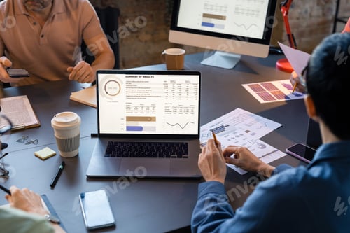 Preview: People working with laptop at meeting