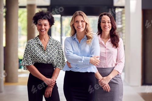 Preview: Portrait Of Multi-Cultural Female Business Team Inside Modern Office Building