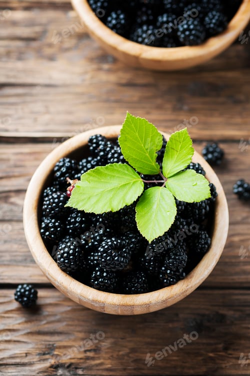 Preview: Sweet wild blackberry on the wooden table