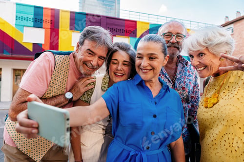 Preview: Group of senior friends meeting outddors in the city and having fun