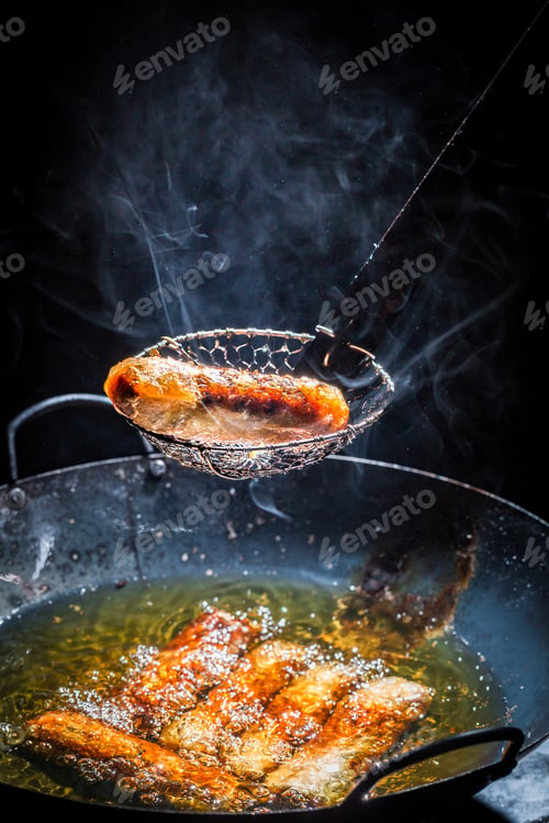 Preview: Tasty spring rolls frying on the pan