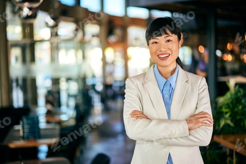 Preview: Confident Asian Business Woman Smiling in Office Environment