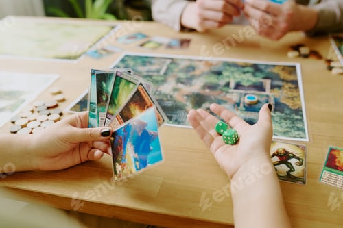 Preview: Unrecognizable Player Holding Cards and Dice