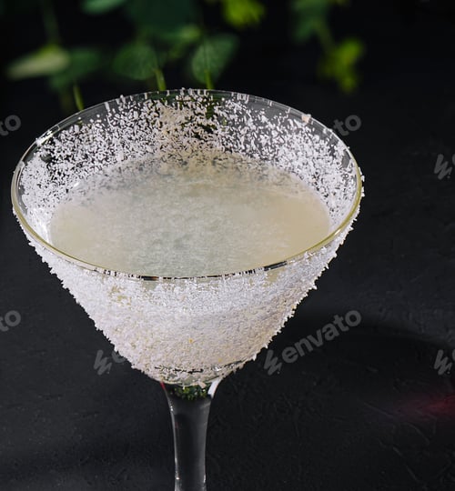 Preview: martini glasses of coconut alcohol drink closeup