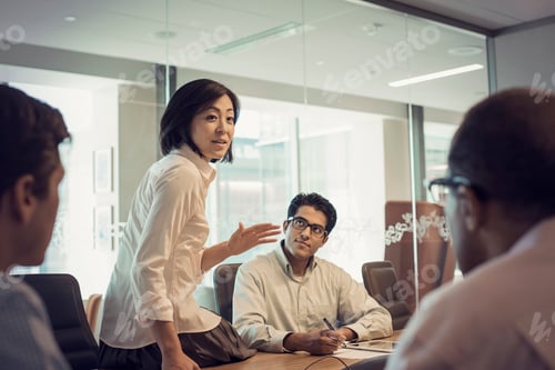 Preview: Business people in meeting having interesting discussion