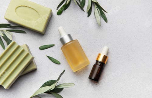 Preview: Natural soap, essential oil and olive branches creating relaxing atmosphere