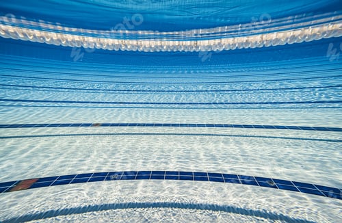Preview: Olympic Swimming pool under water background.
