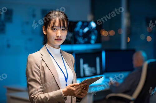 Preview: Young serious female programmer or developer in formalwear