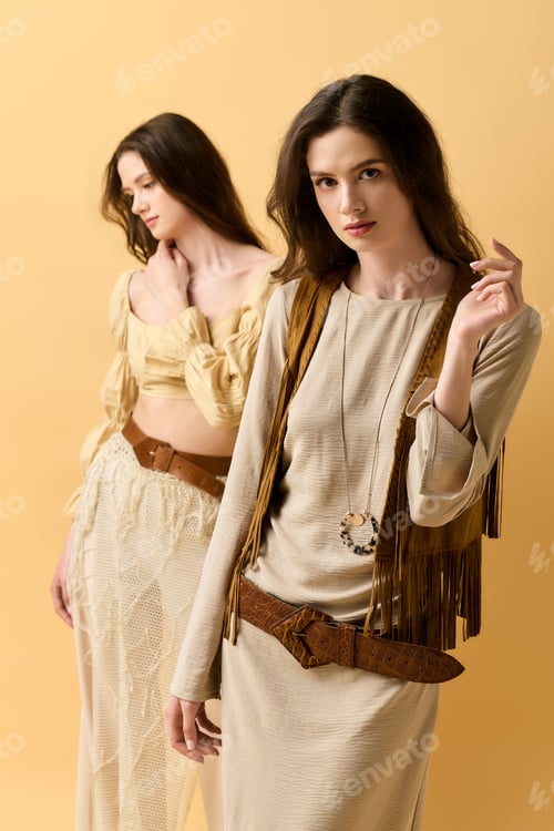 Preview: Stylish twin sisters showcase their unique fashion in a vibrant and artistic setting