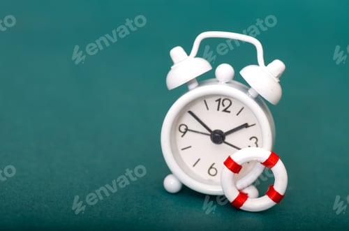 Preview: Time Management Metaphor: Vintage Clock and Life Ring Symbolizing Saving Time