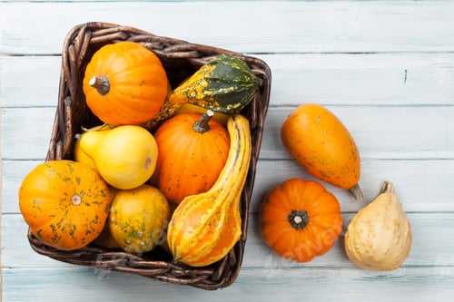 Preview: Autumn pumpkins on wooden table