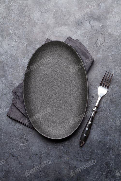 Preview: Empty plate and fork