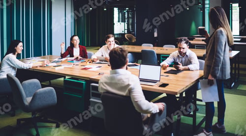 Preview: Office staff attentively listening speech
