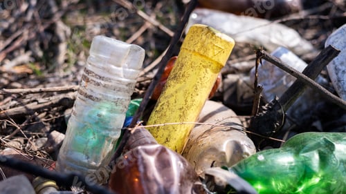 Preview: Ground littered with plastic bottles