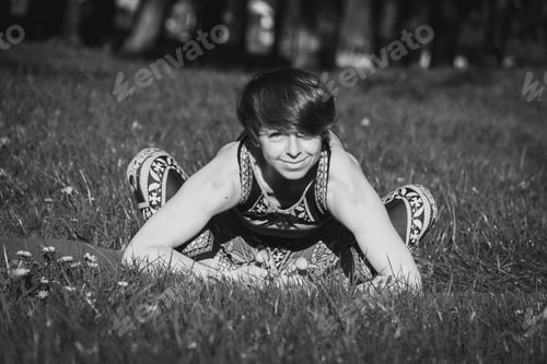Preview: Yoga. The Girl In The Park Is Practicing Yoga