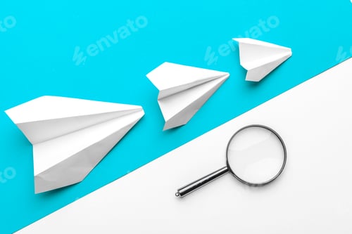 Preview: paper airplanes on pastel colored background. childhood,freedom and diversity concept