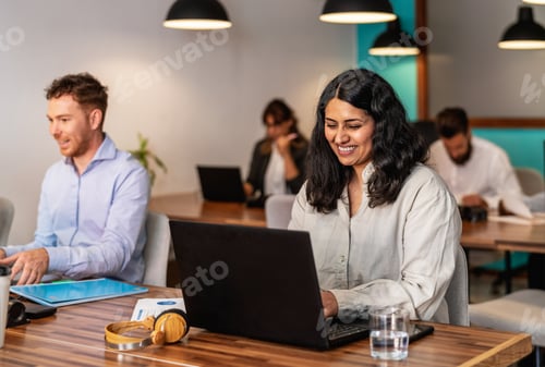 Preview: Multiracial people working inside coworking creative space