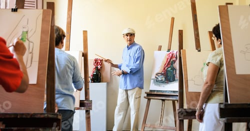 Preview: Teacher At Work In Painting Class With Senior Students