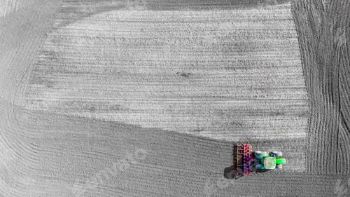 Preview: Aerial view of a tractor on an agricultural field