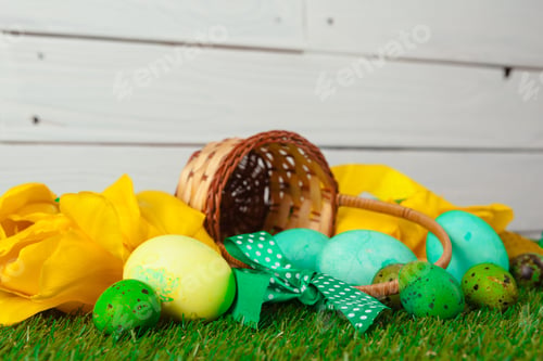 Preview: Easter Eggs with flower on Green Grass