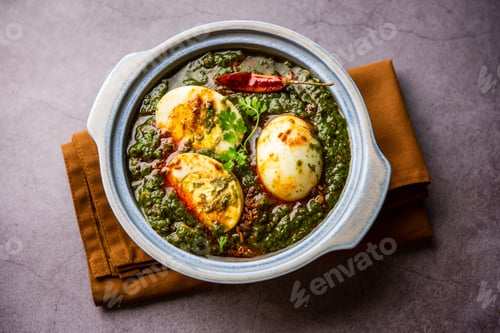 Preview: Spinach egg curry is an Indian non vegetarian dish made using palak gravy with eggs