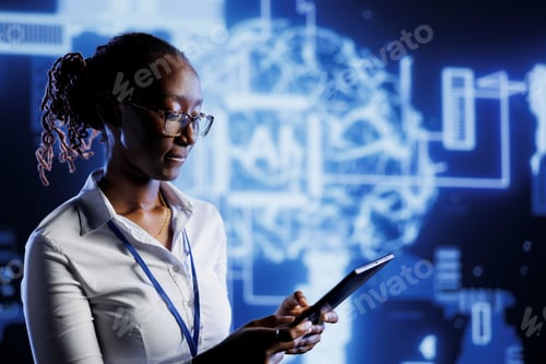 Preview: IT admin writes AI code on laptop