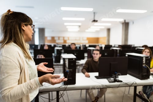 Preview: Hispanic teacher doing lecture in high school - Education concept