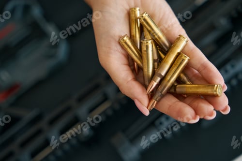 Preview: Combat cartridges on a tender female palm