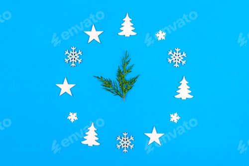 Preview: Concept clock made of christmas decoration showing five to midnight New Year