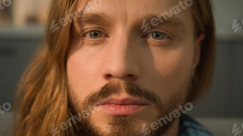 Preview: Tired sleeping man lying head leaning sofa couch wake up waking face looking at camera calm serious