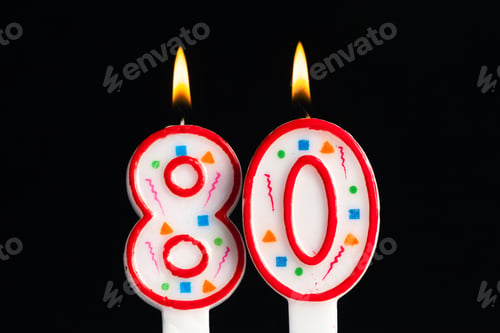 Preview: Celebration of an 80th birthday with colorful candles and vibrant decorations