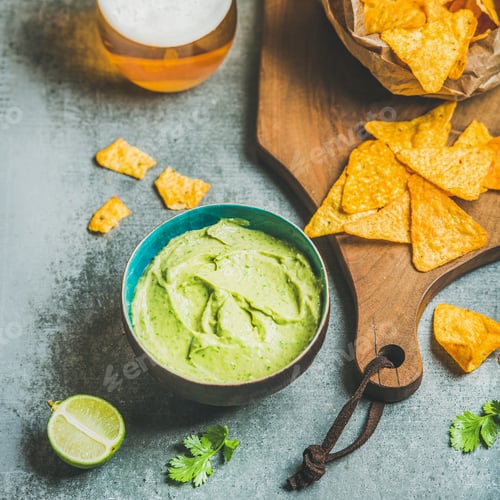 Preview: Mexican corn chips, fresh guacamole sauce and beer, square crop