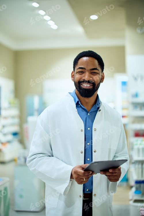 Preview: Friendly Pharmacist Smiling in a Modern Store Holding a Digital Tablet