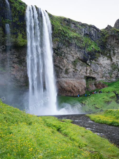 Preview: A waterfall cascade over a sheer cliff.