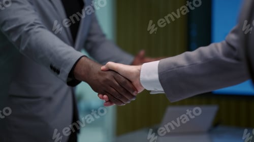 Preview: Business people shaking hands and meeting together in conference room