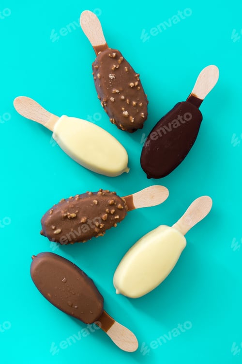 Preview: Chocolate and white chocolate ice cream bars on turquoise background