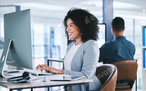 Preview: One happy young mixed race call centre telemarketing agent talking on a headset while working on a