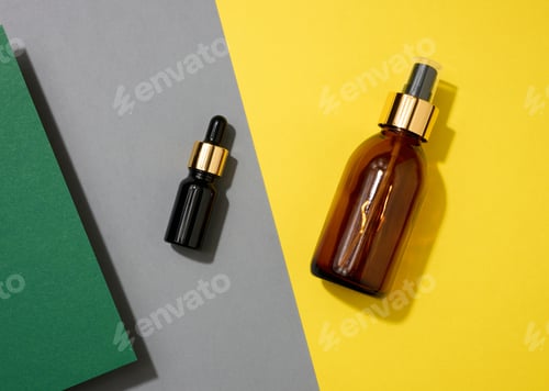 Preview: Glass cosmetic brown bottles with a pipette on a yellow background. Cosmetics SPA
